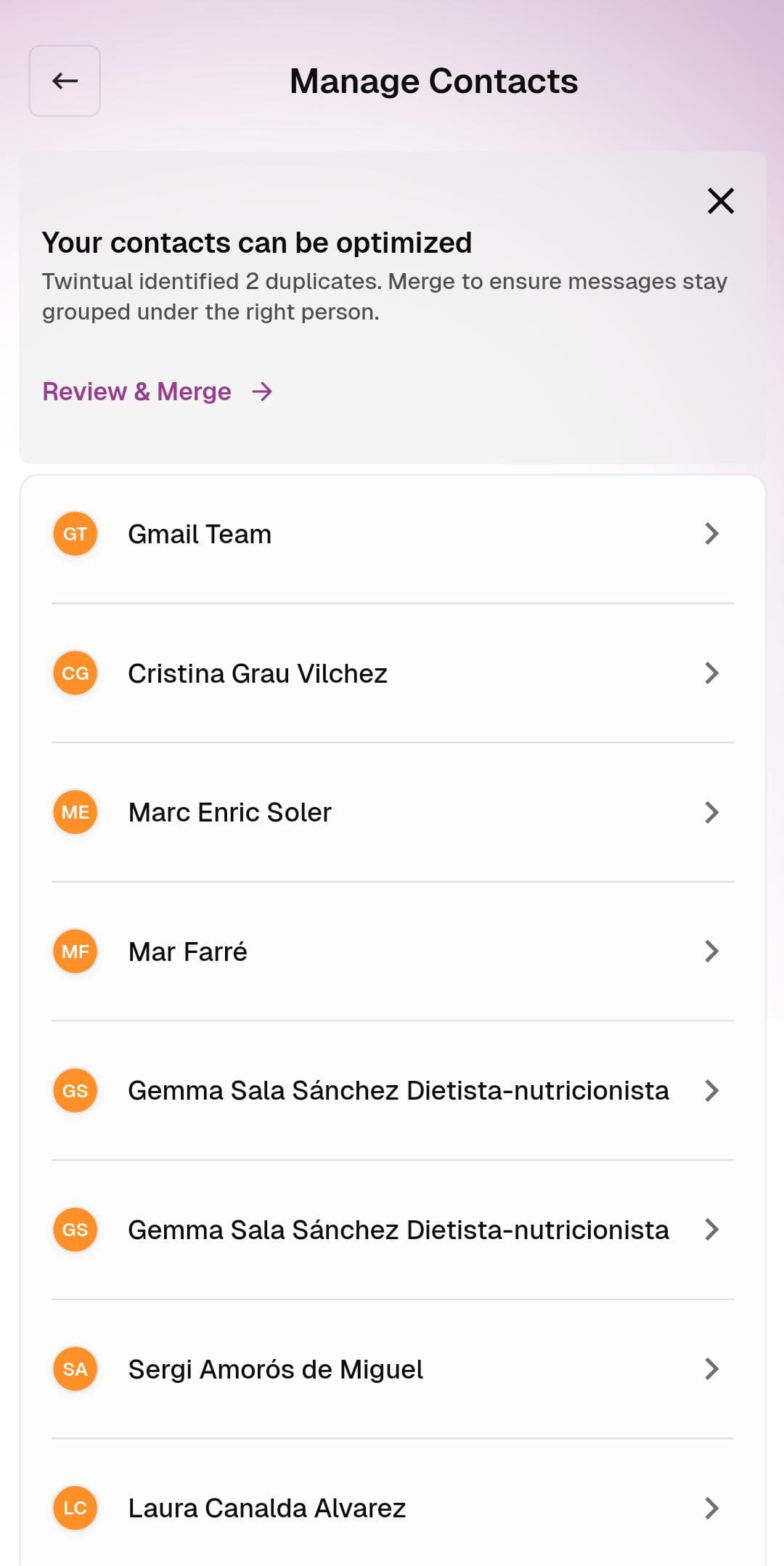 Manage Contacts screen with merge suggestion